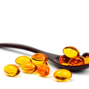 Wooden,Spoon,With,Fish,Oil,omega-3,lecithin,dha,,Vitamins,Capsules,On,White,Background.